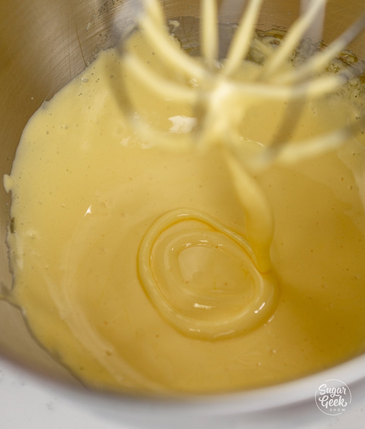 whisk drizzling eggs in the ribbon stage