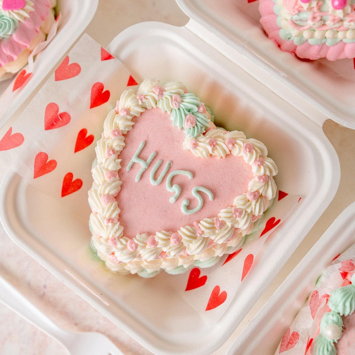 heart shaped cake in a to go box