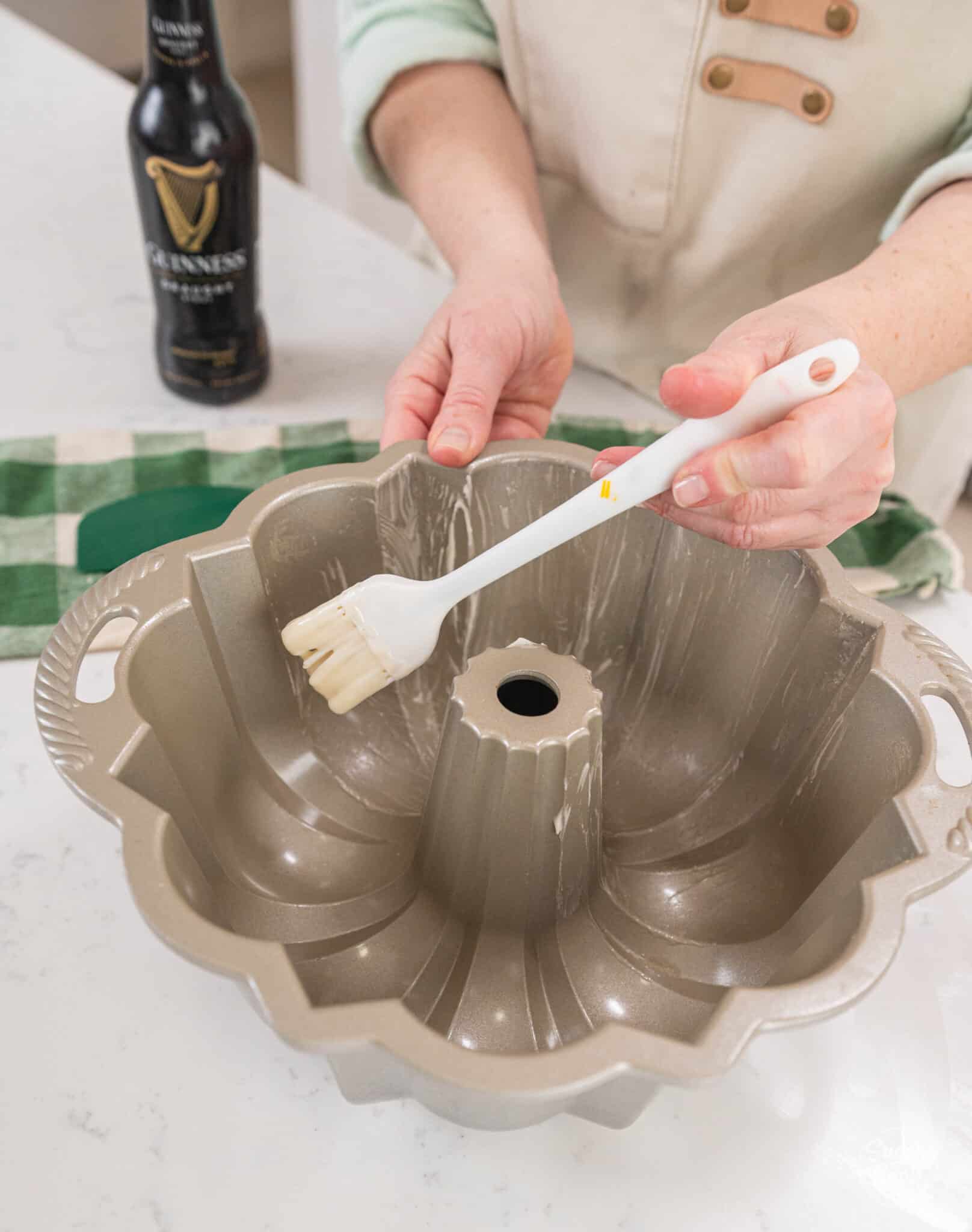 greasing a bundt pan with pan release