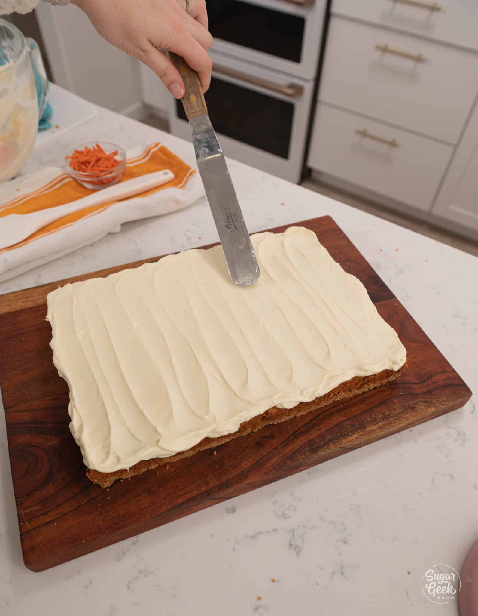 Carrot cake frosted in cream cheese frosting