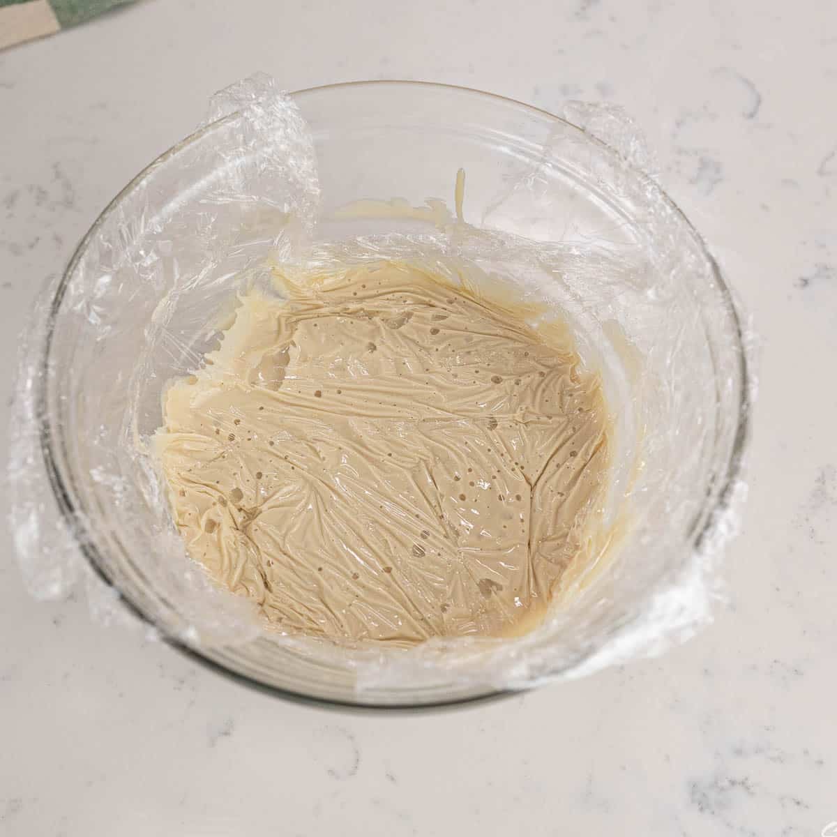 Guinness ganache covered with plastic wrap
