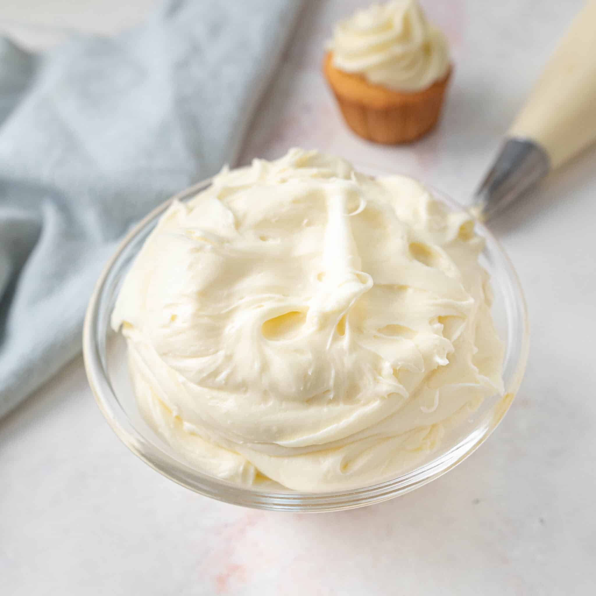Glass bowl of cream cheese frosting