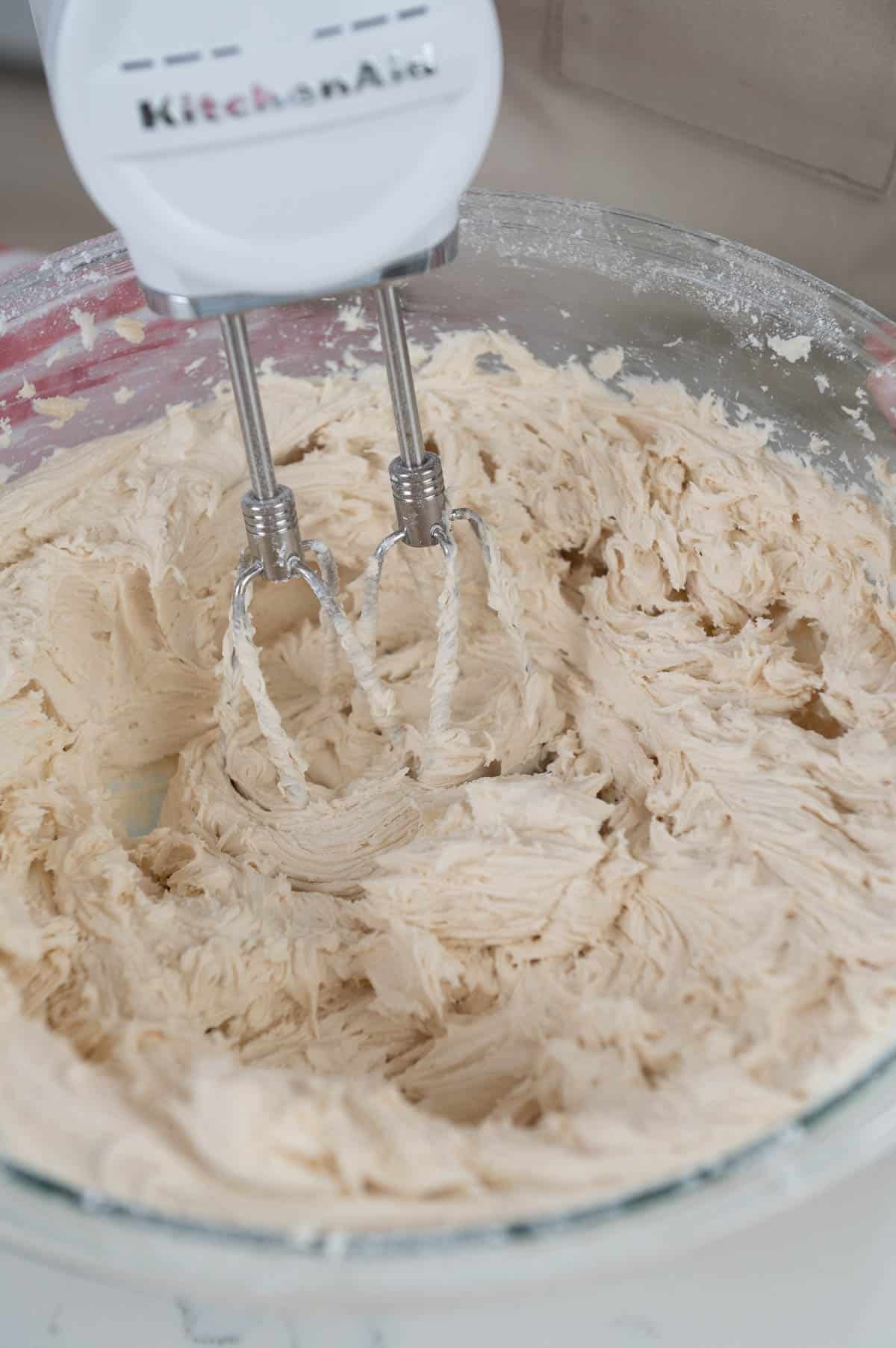 maple frosting in a large bowl