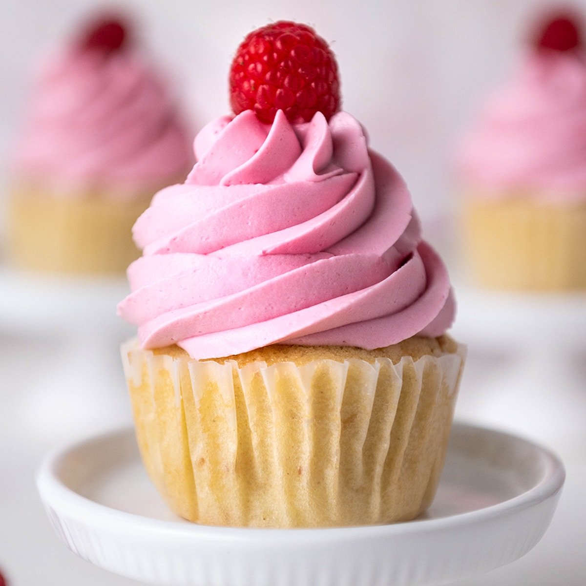 raspberry buttercream on a vanilla cupcake