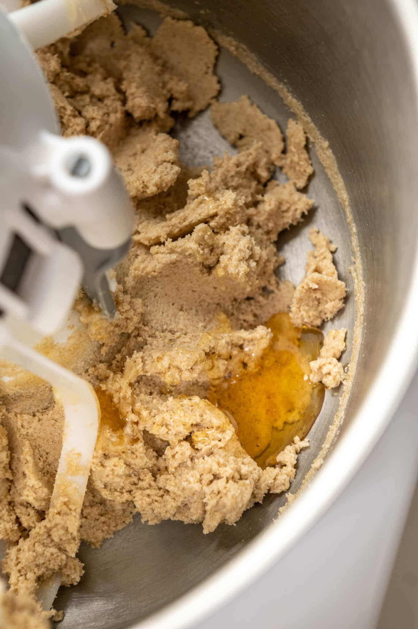 close up creamed butter and sugar in the bowl of a stand mixer