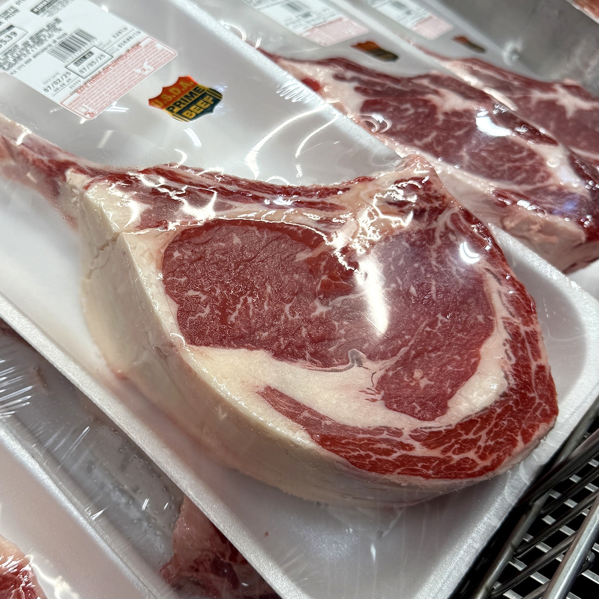 close up of prime tomahawk steak in the grocery store