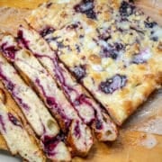 close up of sliced lemon blueberry sourdough focaccia