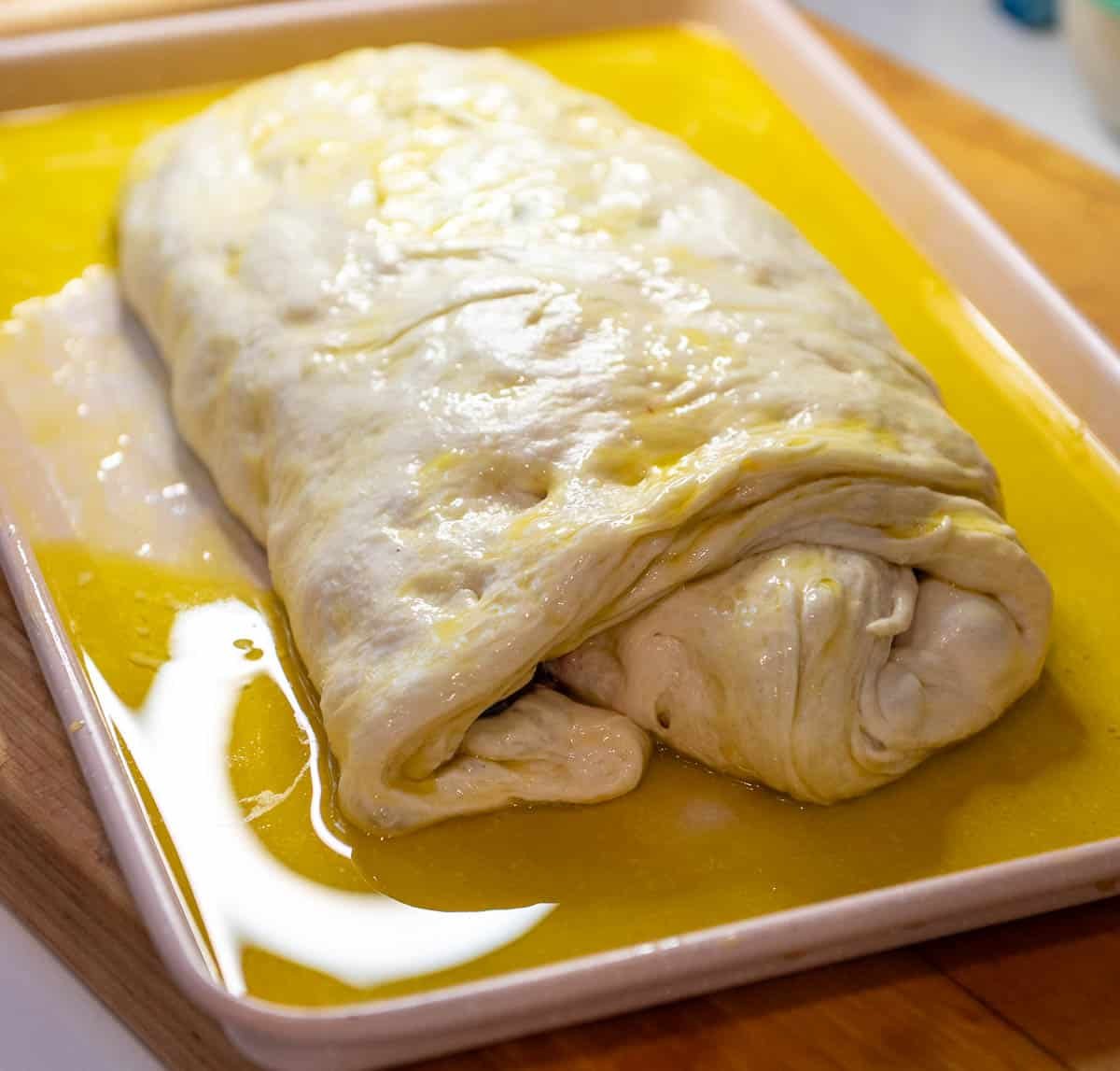 lemon blueberry sourdough focaccia book fold on sheet pan