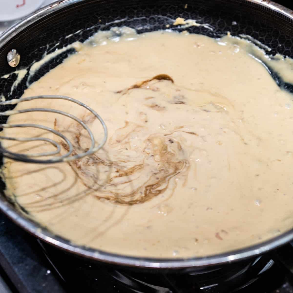 Creamy Dijon sauce with Worcestershire sauce added and whisked in.