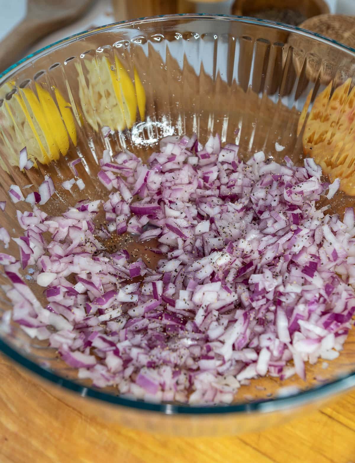 diced onions in a clear bowl