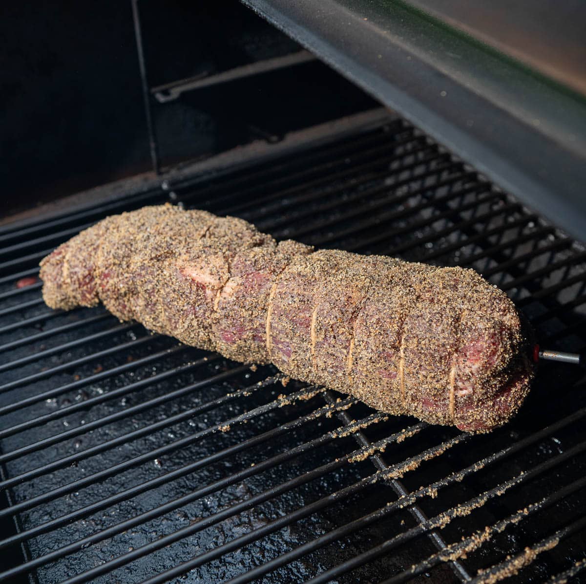 The finished smoked beef tenderloin inside the smoker.