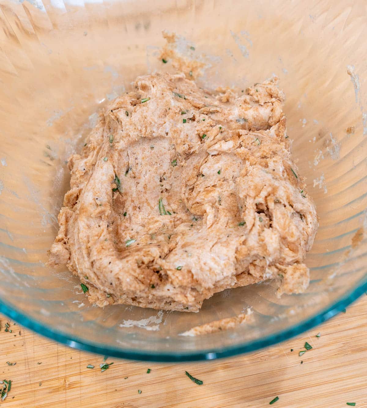 All ingredients mixed together in the glass bowl.