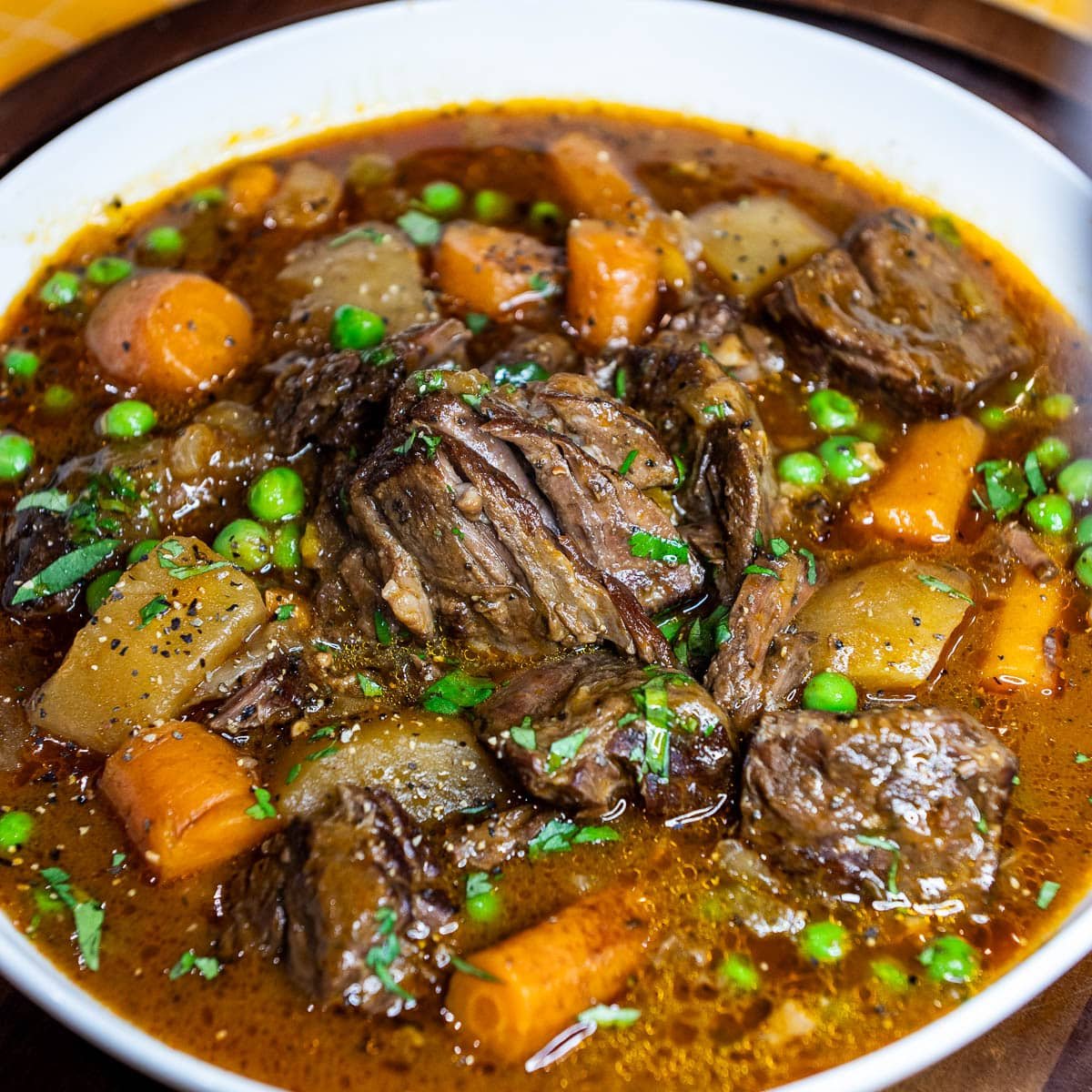 The finished Instant Pot Beef Stew in a bowl.