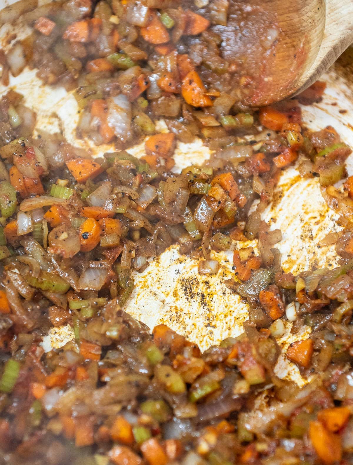 Veggies, butter, and garlic are cooked down and soft giving the final product: the Mirepoix.