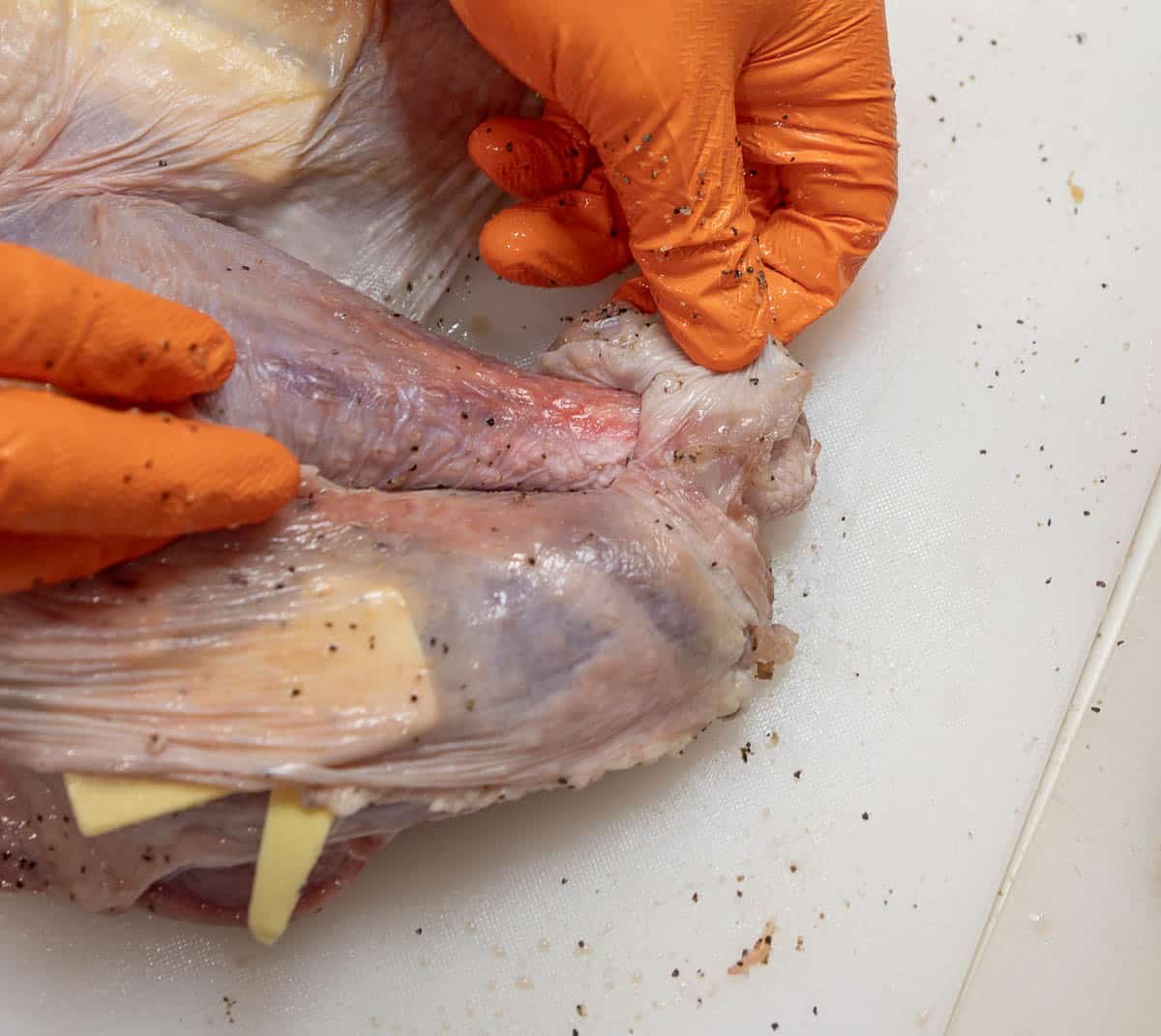 The drumbstick is inserted into the pocket from the punctured skin.