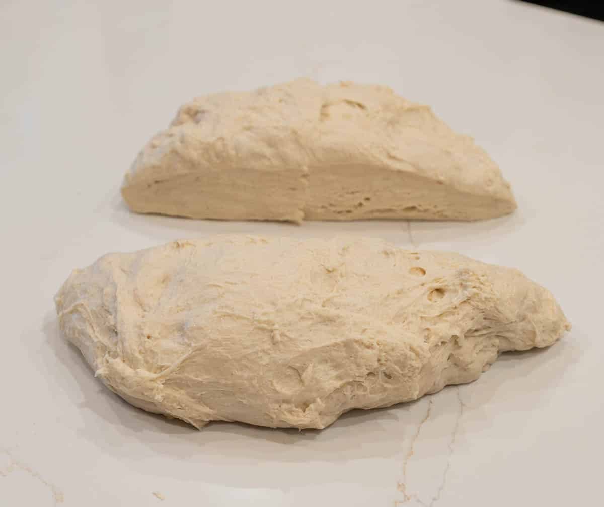 Formed dough cut in half. 