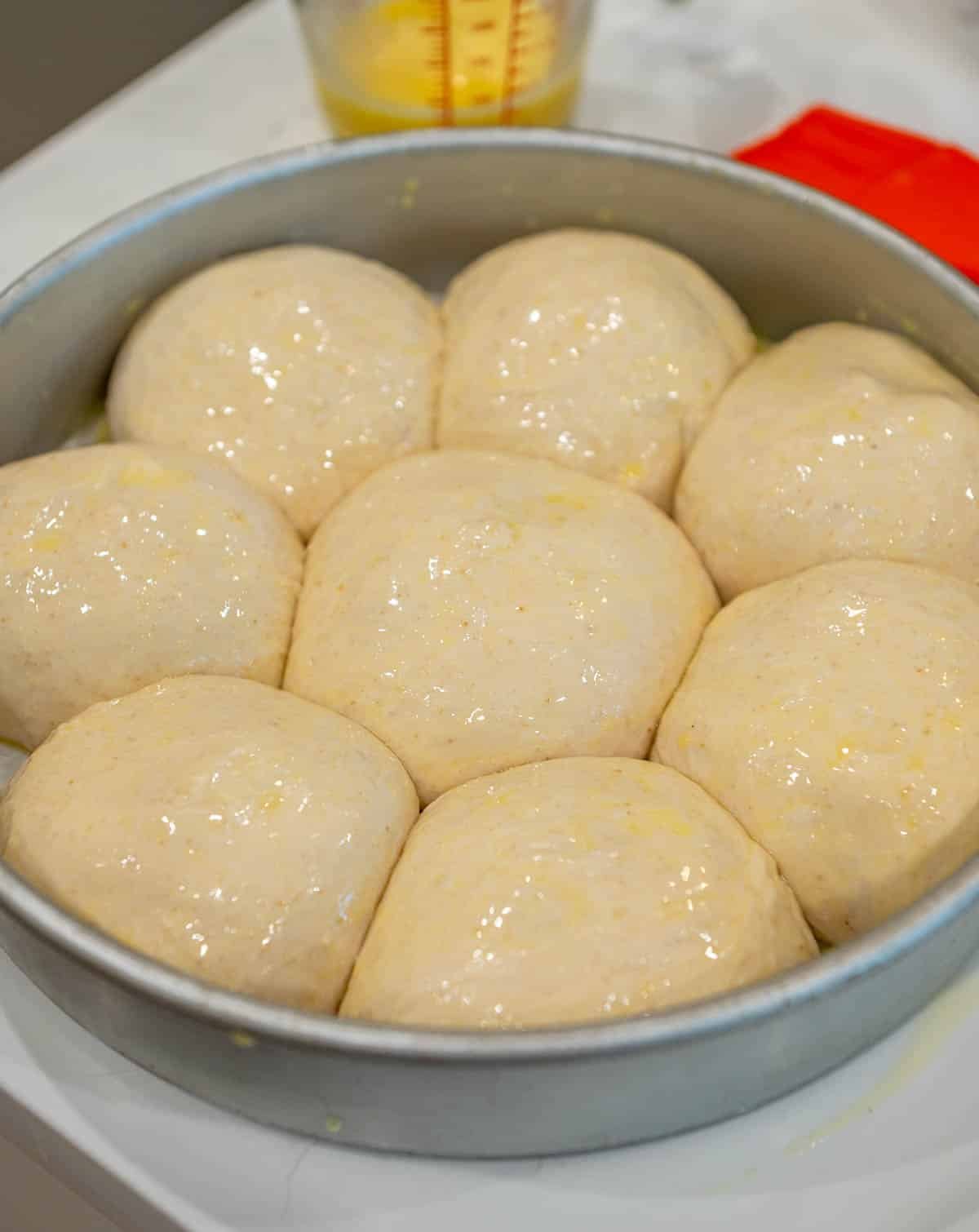 Rolls brushed with melted butter.
