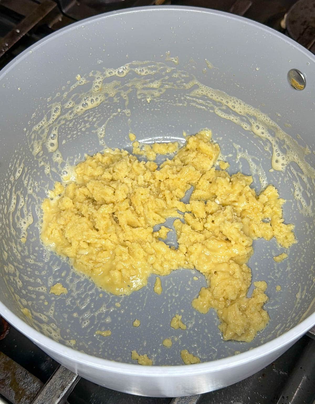 Butter and flour is combined to make a paste.
