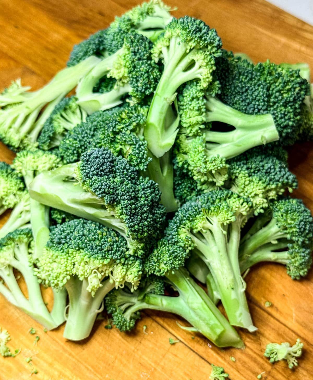 Trimmed and chopped broccoli that is ready to steam.