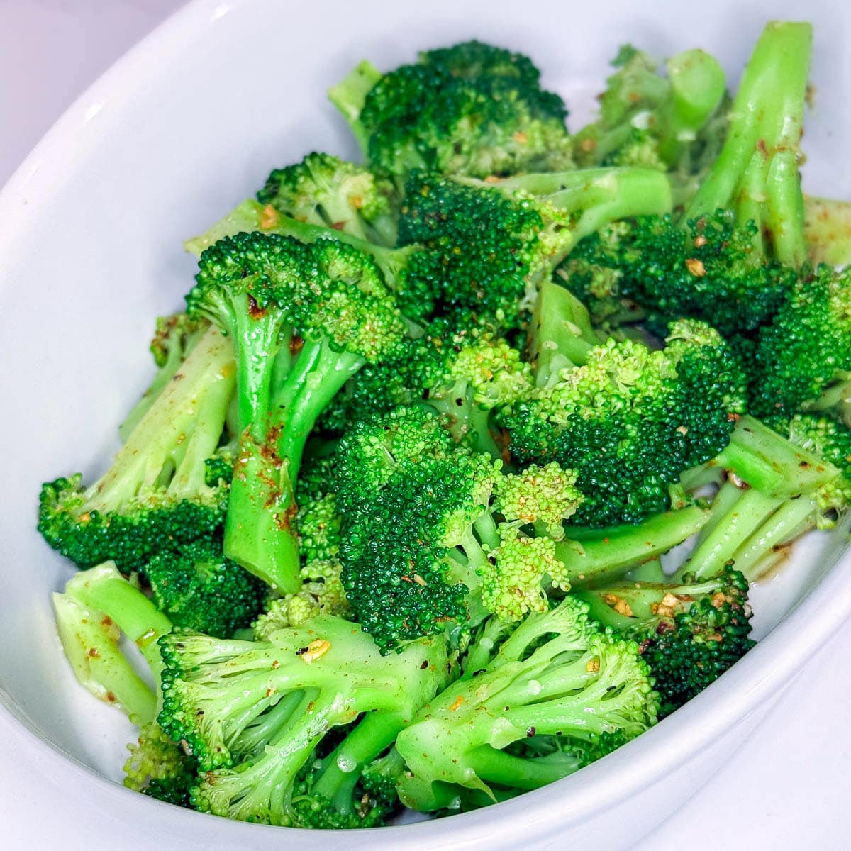 A close-up photo of steamed broccoli.