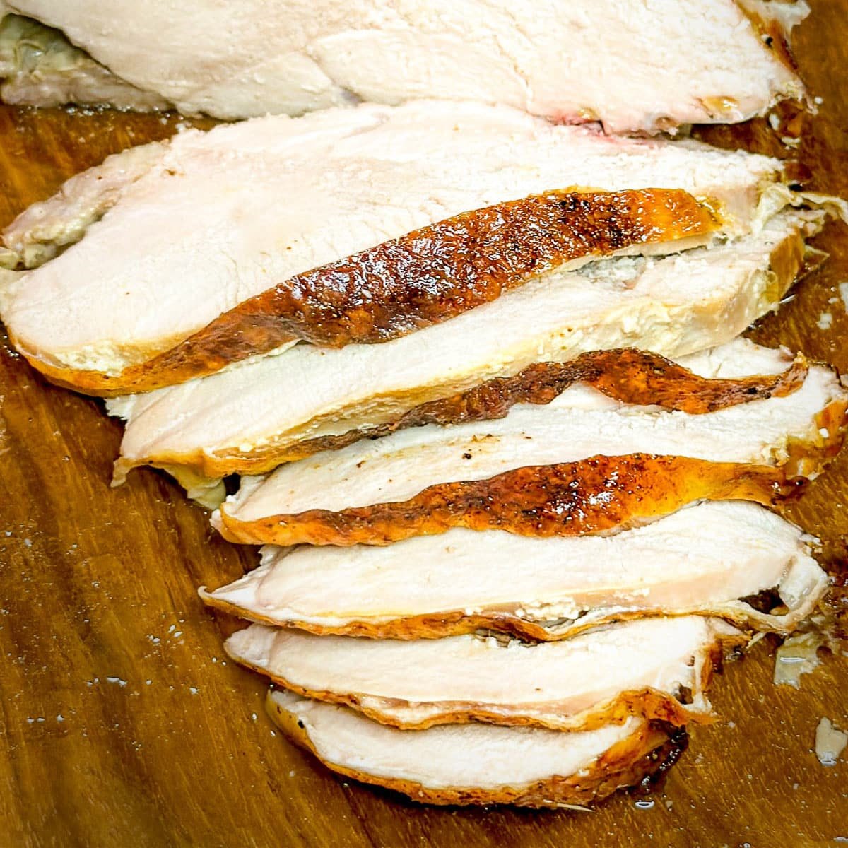 A close-up of sliced turkey breast for the "How to Cook a Turkey Breast with Turkey Gravy" recipe.