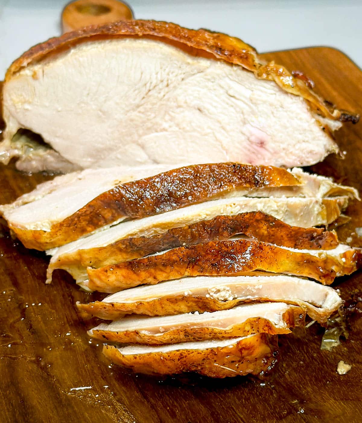 A close-up of sliced turkey breast for the "How to Cook a Turkey Breast with Turkey Gravy" recipe.