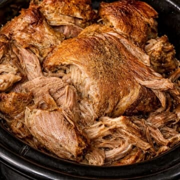 close up of slow cooker pulled pork in a crock pot