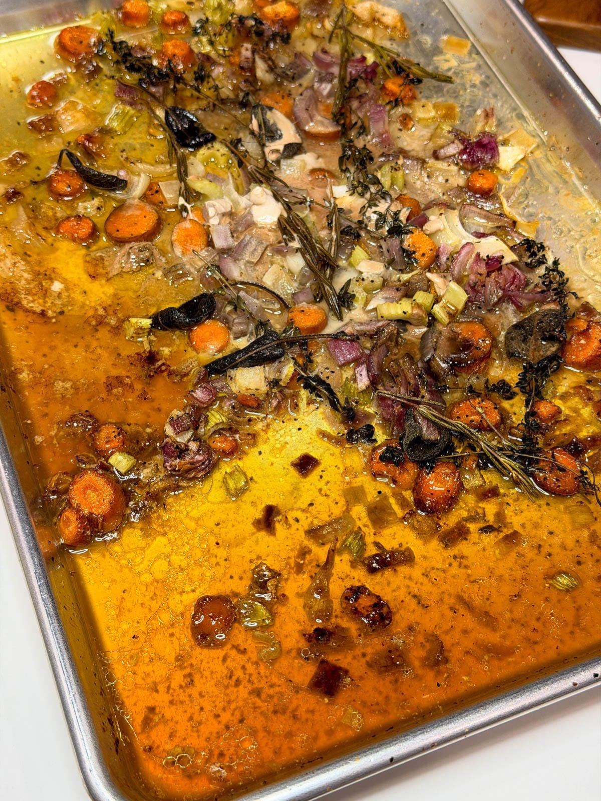 Roasted vegetables in a sheet pan.