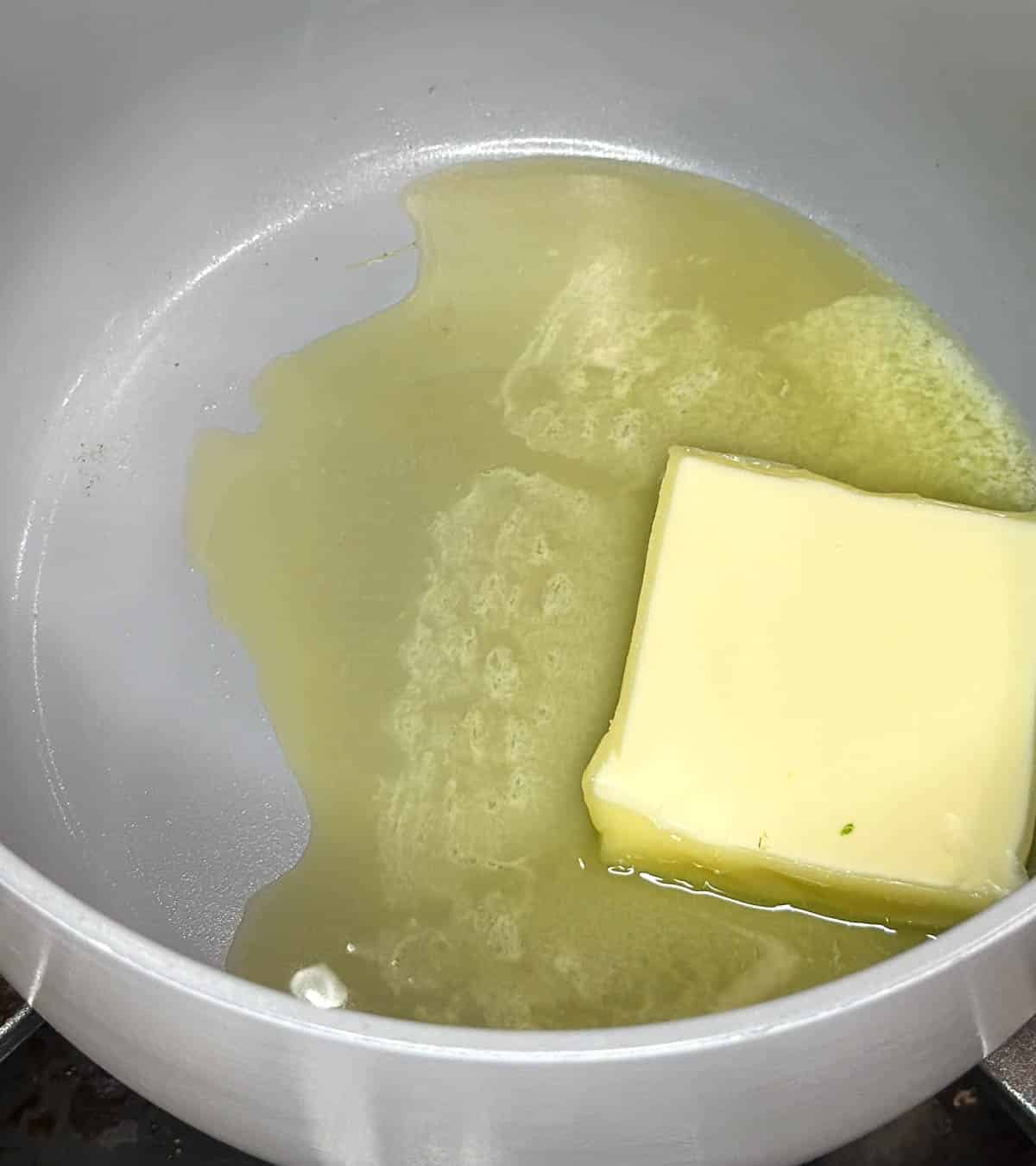 Butter melting in pot.