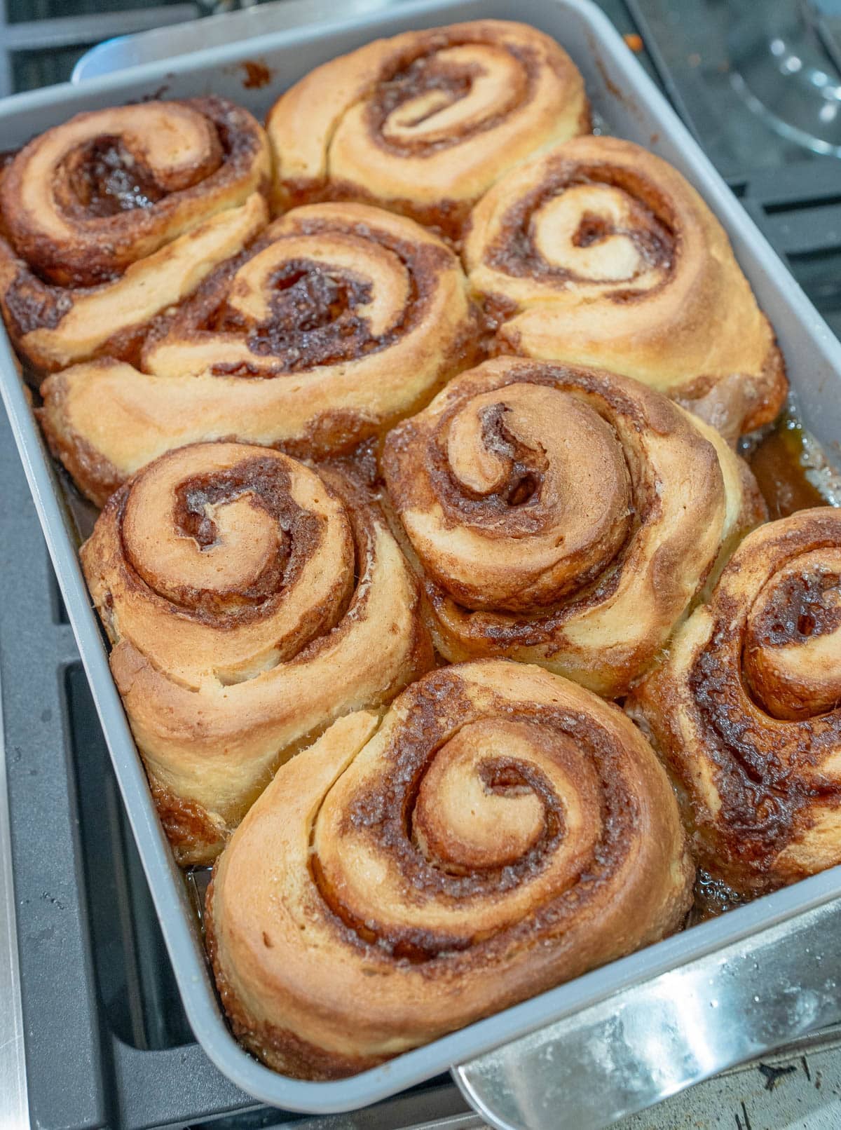 Freshly baked cinnamon rolls on a pan