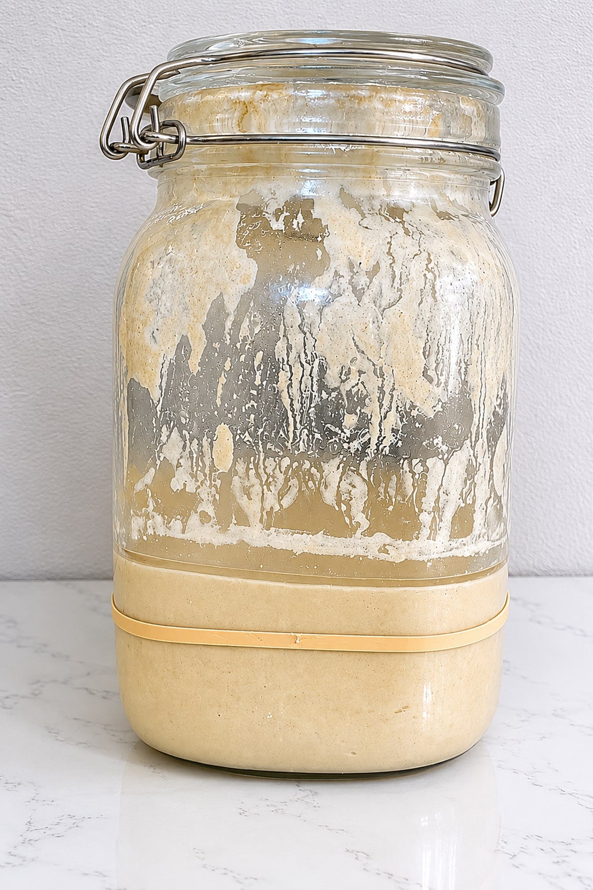 Sourdough discard in a jar with a lid.