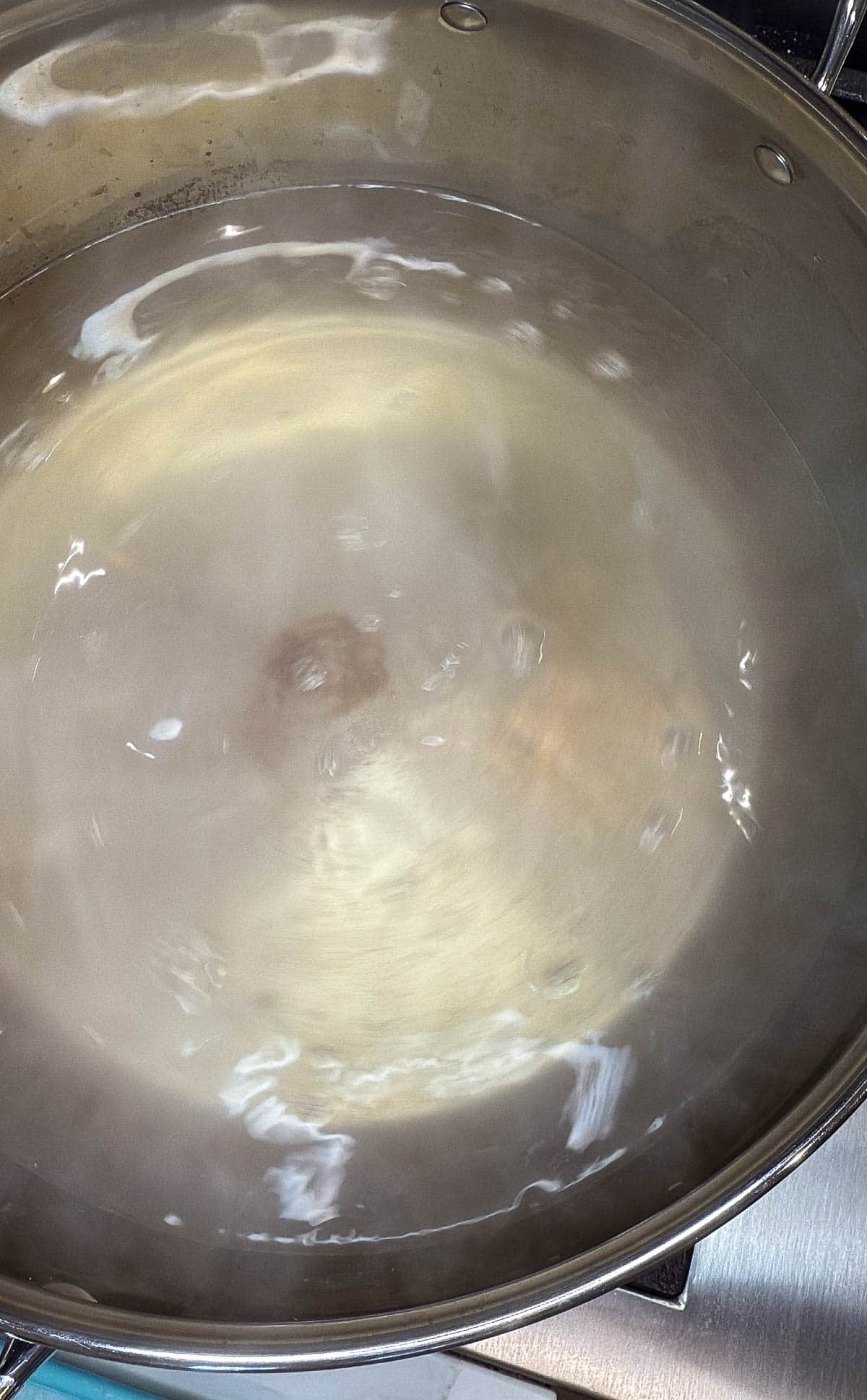 Bagel water bath in a big pot.
