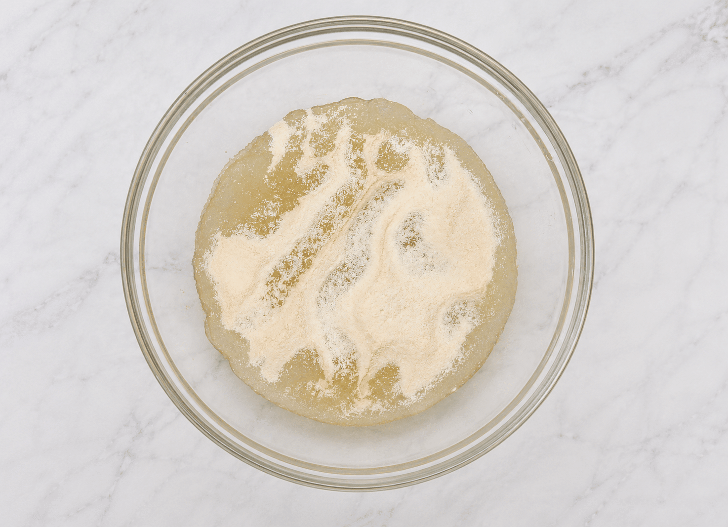 Gelatin added to water to "bloom."