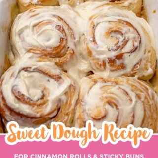 Pan of cinnamon rolls made with sweet dough covered in cream cheese frosting