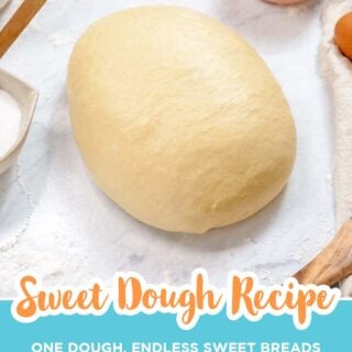 Smooth ball of sweet dough on a floured counter